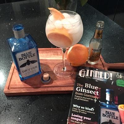 perfect blue bottle gin and tonic with grapefruit