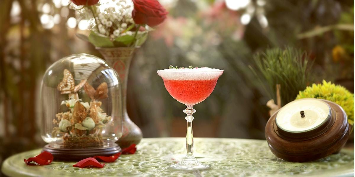 The fuschia is bright for this picture-perfect floral gin bar
