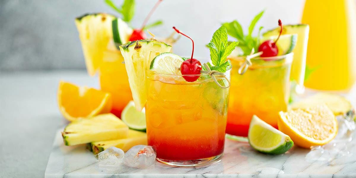 We'll be sipping this tropical gin punch all summer all! 